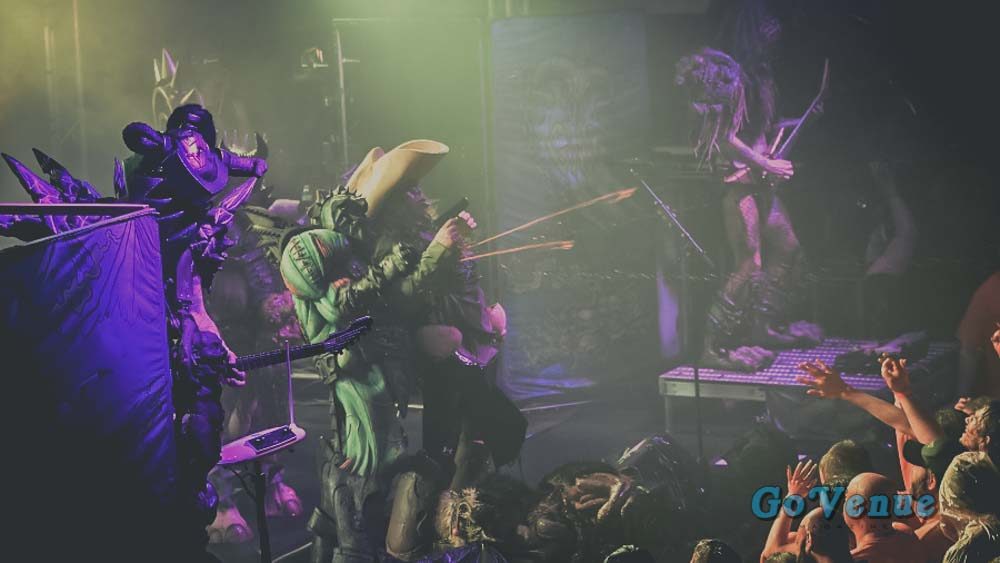 GWAR rains gallons of blood onto a sold-out crowd in Saginaw, Michigan.